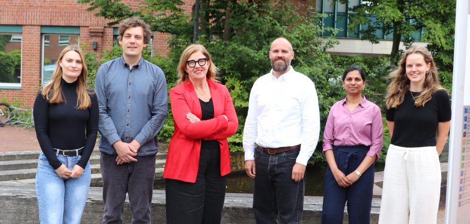 The picture shows the Rising Team.