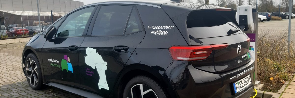 Grafschafter Carsharing Carsharing Wagen des Landkreises Grafschaft Bentheim am Bahnhof Neuenhaus. Schwarzer VW ID3